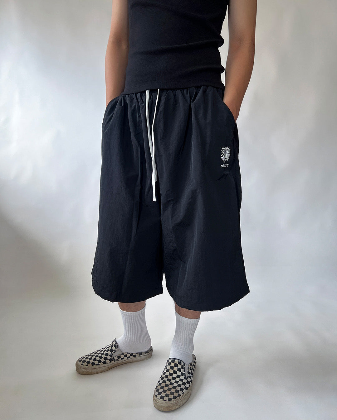 AFTERPARTY Nhím Nylon Shorts - Black on model